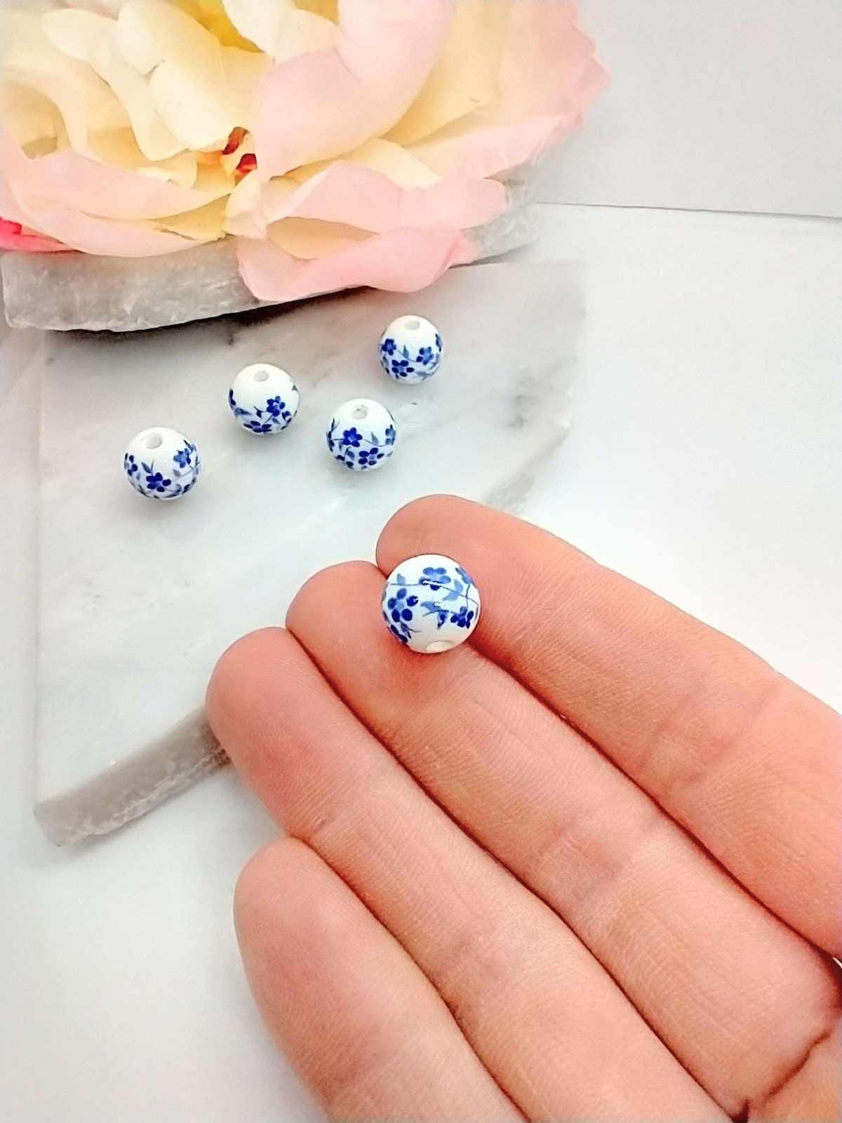 Blue Ceramic Flower Beads: 10mm Floral Jewelry Supplies (10 Piece Pack)