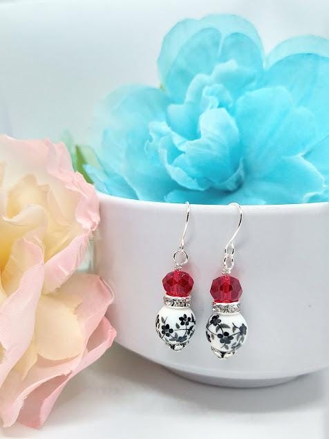 Black Flower Dangle Earrings: Red Glass Bead, Sterling Silver