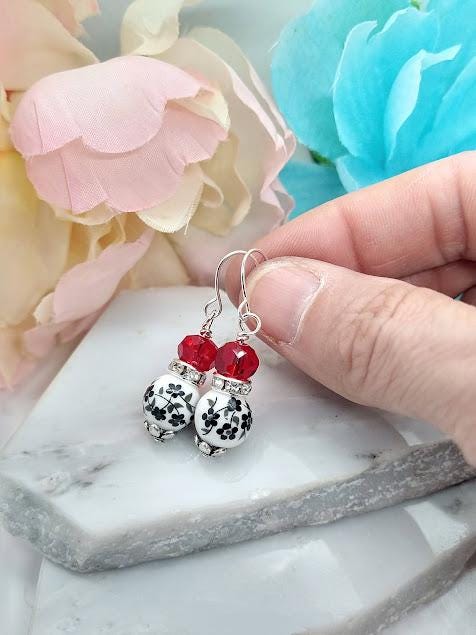 Black Flower Dangle Earrings: Red Glass Bead, Sterling Silver