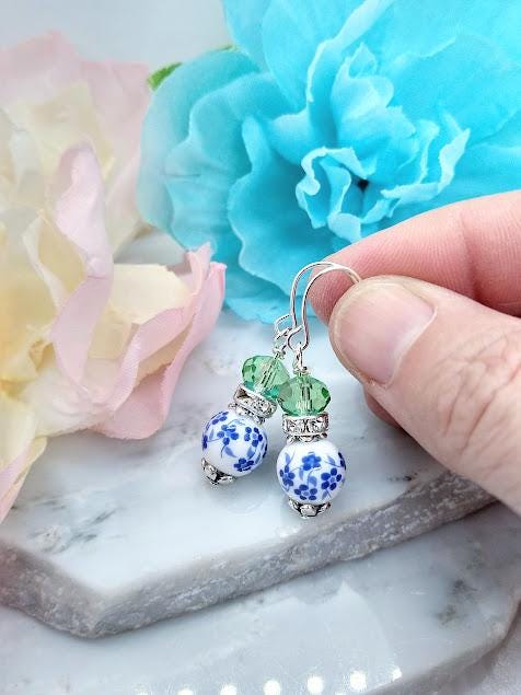 Blue Floral Dangle Earrings: Silver Plated, Green Accents