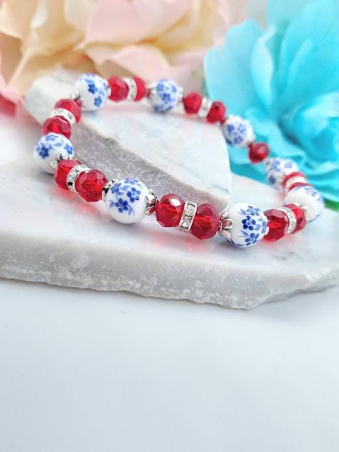 Blue Porcelain Flower Bracelet: Red Crystal Beaded Stretch Jewelry