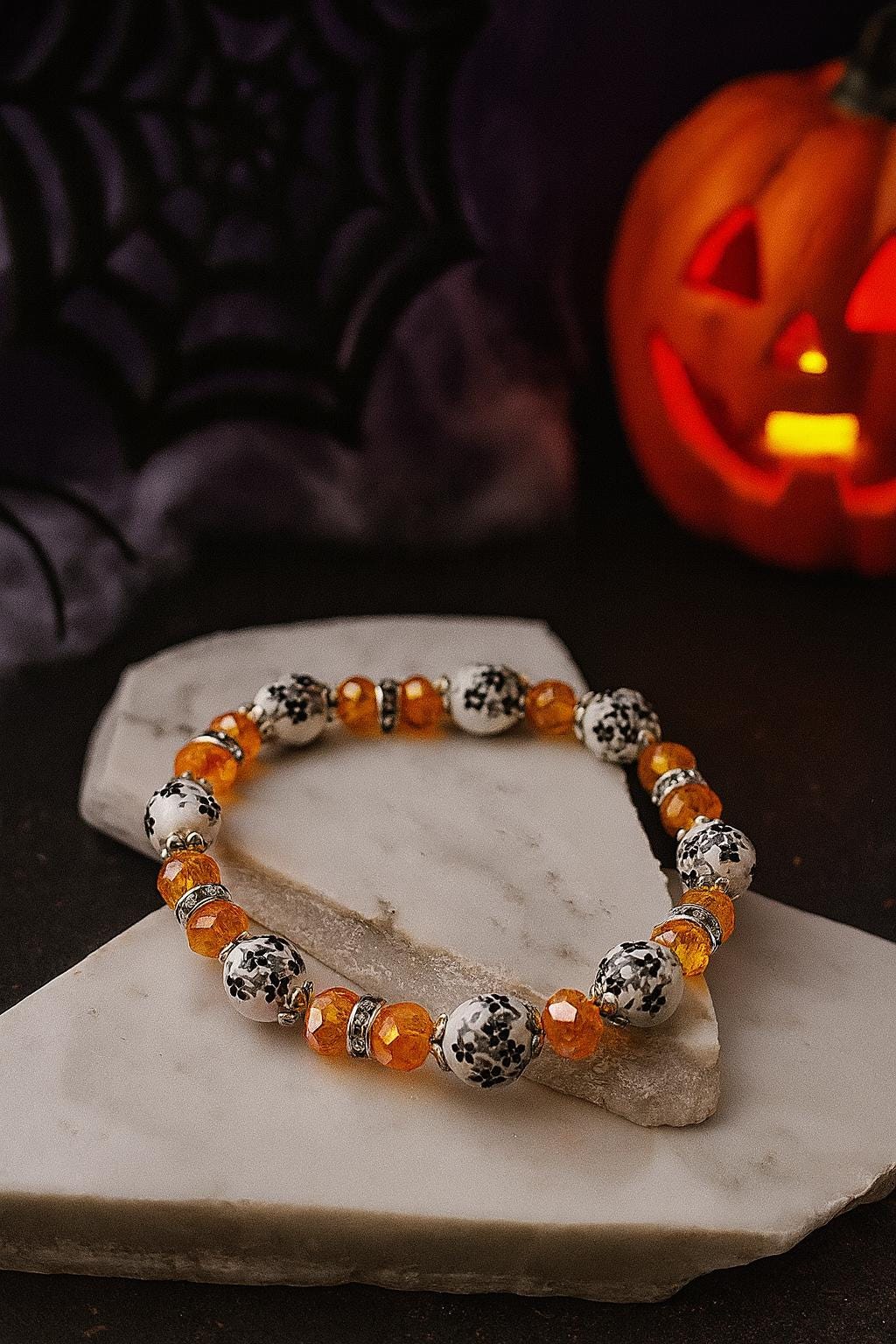Handmade Halloween Beaded Bracelet: Black Floral & Orange Crystal Jewelry